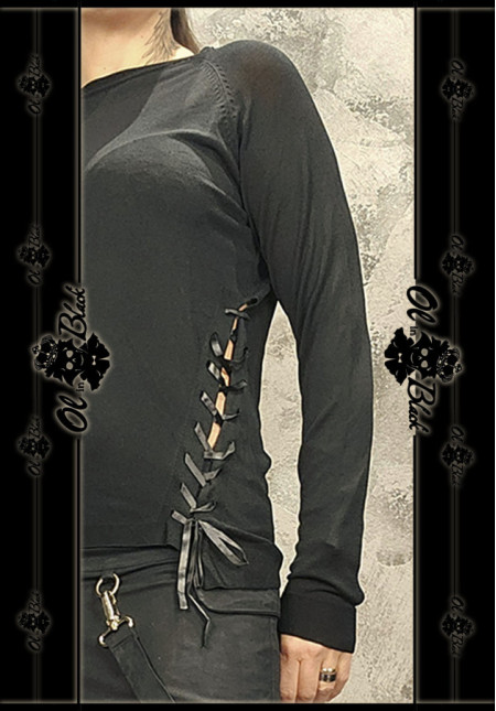 JERSEY FINO CON LAZOS Y APERTURAS LATERALES. TU