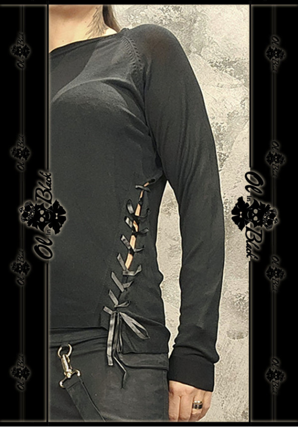 JERSEY FINO CON LAZOS Y APERTURAS LATERALES. TU