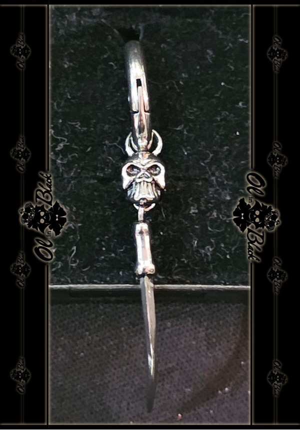 PENDIENTE CALAVERA Y GARRA