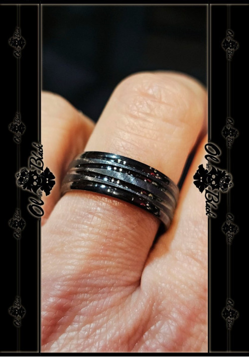 ANILLO NEGRO AC. INOX. SINUOSAS